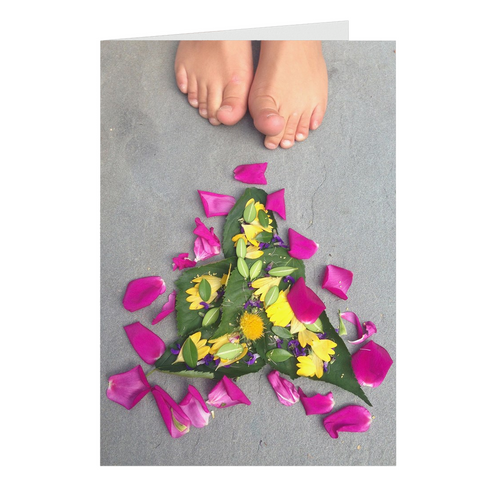 Meghan Nathanson Artistry color photo of child's toes with flower art arrangement on folded greeting card